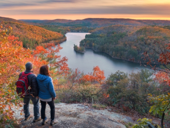 Couple overlooking vista scenery at Peoples State Forest